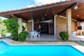 BH4 · BH4: CASA COM PISCINA AO LADO DA PRAIA GRANDE